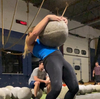 Push Your Limits with 24 Rounds of Intense Atlas Stone Strength Training